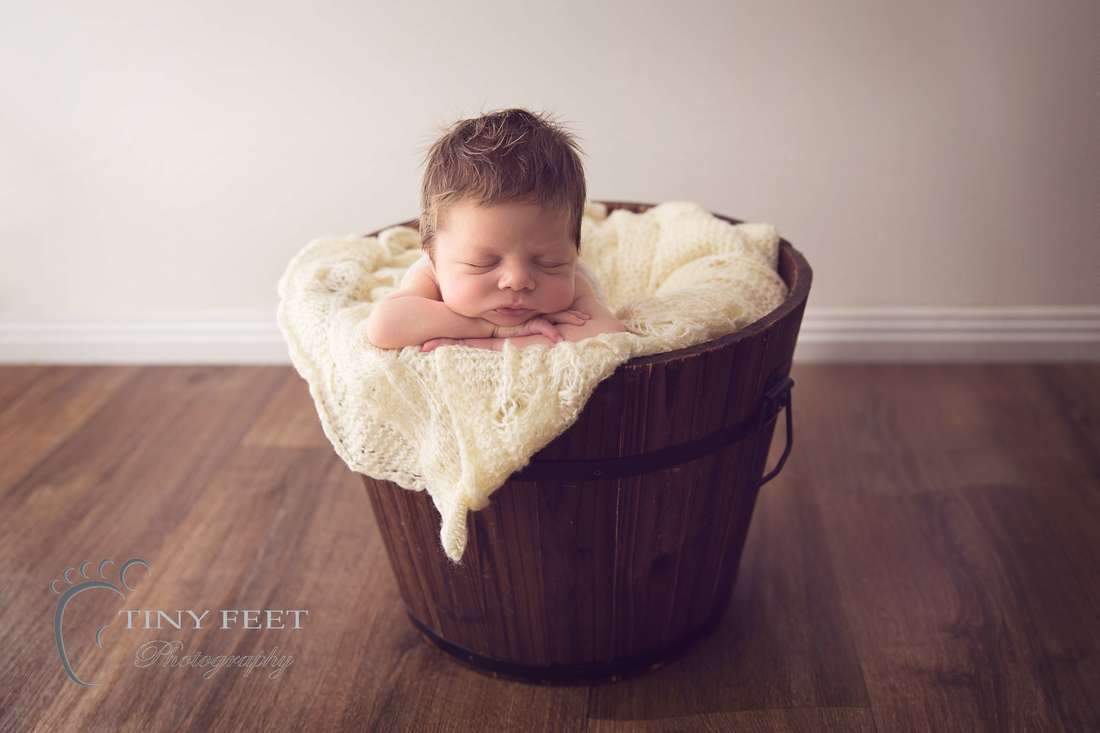 Newborn bucket posing