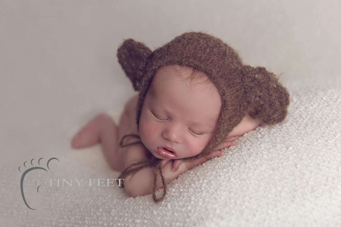 Tiny Feet Photography, newborn baby boy posed on beanbag