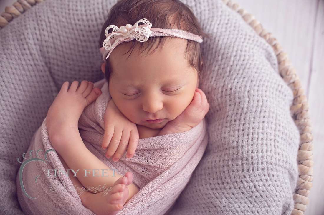 Tiny Feet Photography, newborn baby girl in pink wrap in a bowl