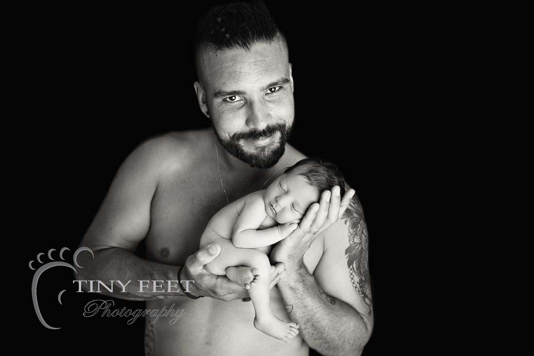 Tiny Feet Photography, newborn baby in black and white posed with dad