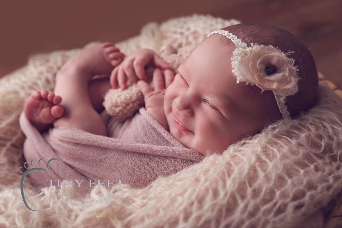 Tiny Feet Photography baby girl backlit image of baby smiling