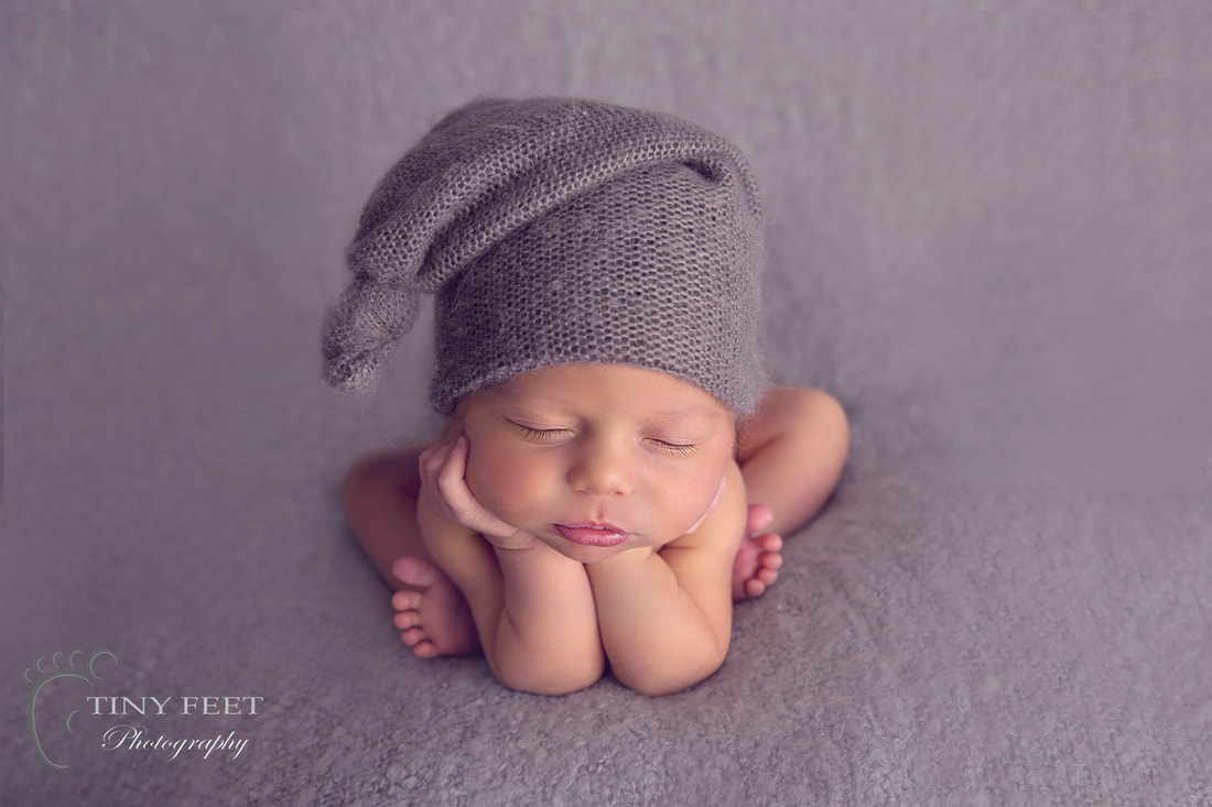 Tiny Feet Photography baby boy in froggy pose on grey blanket