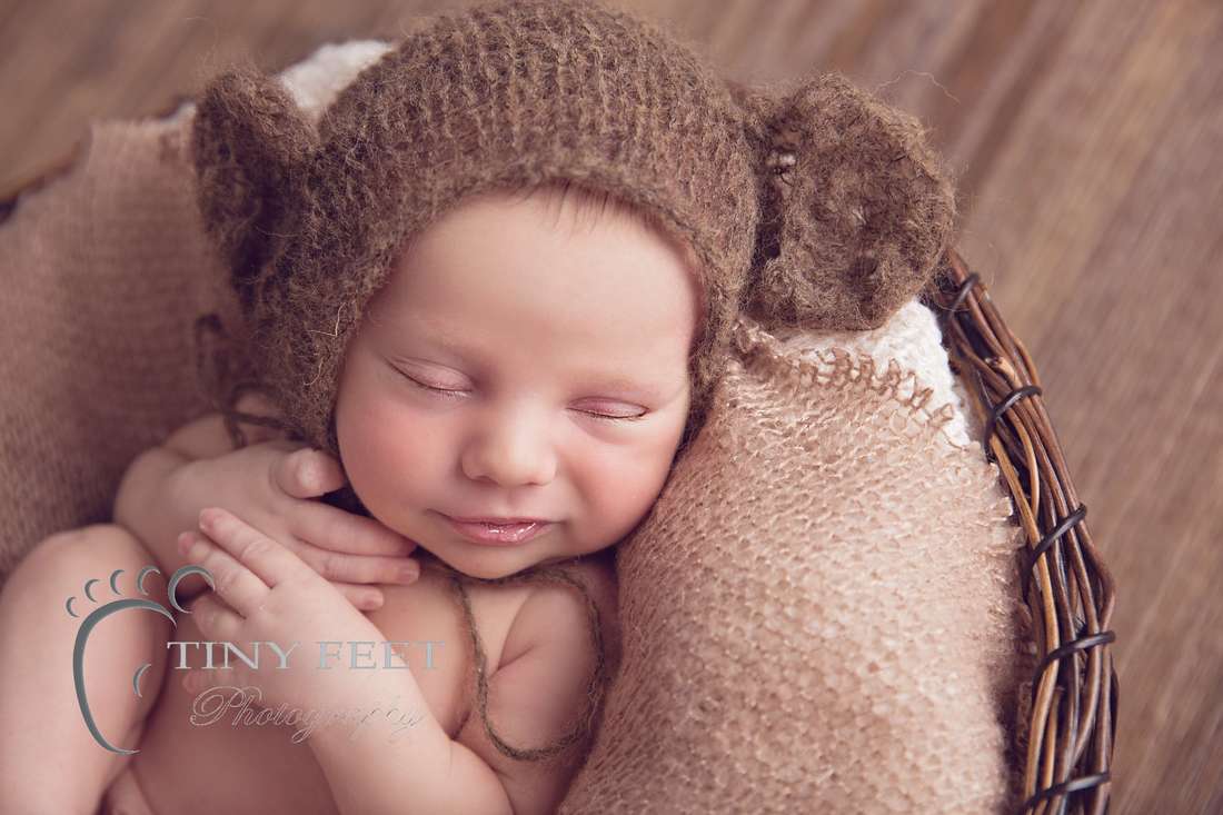 Tiny Feet Photography baby boy wrapped in brown wrap in bowl