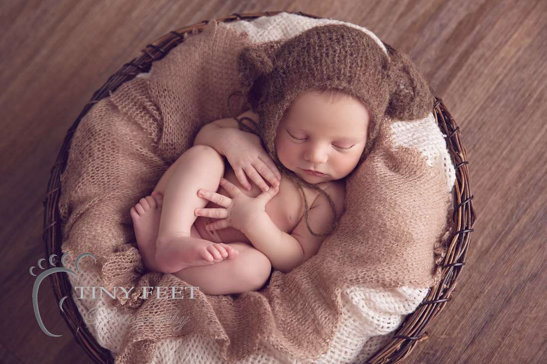 Tiny Feet Photography baby boy wrapped in brown wrap in bowl