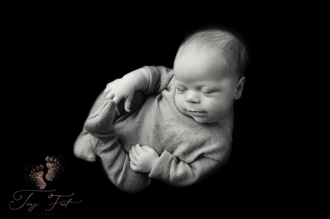 Tiny Feet Photography Newborn baby boy black and white in the womb pose