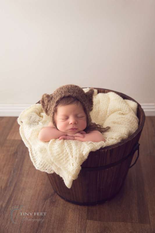 Newborn bucket posing
