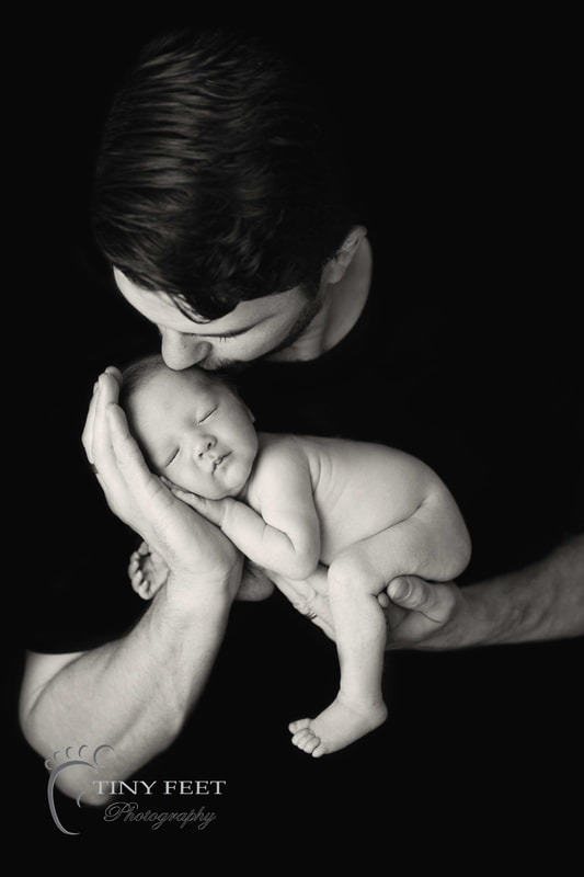 Tiny Feet Photography Black and white  newborn posed with dad