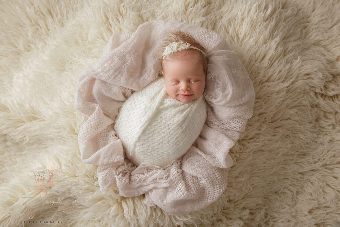 Tiny Feet Photography newborn baby on flokati rug 
