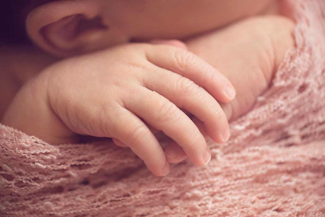 Tiny Feet Photography Newborn baby girl in pink wrap macro images of fingers