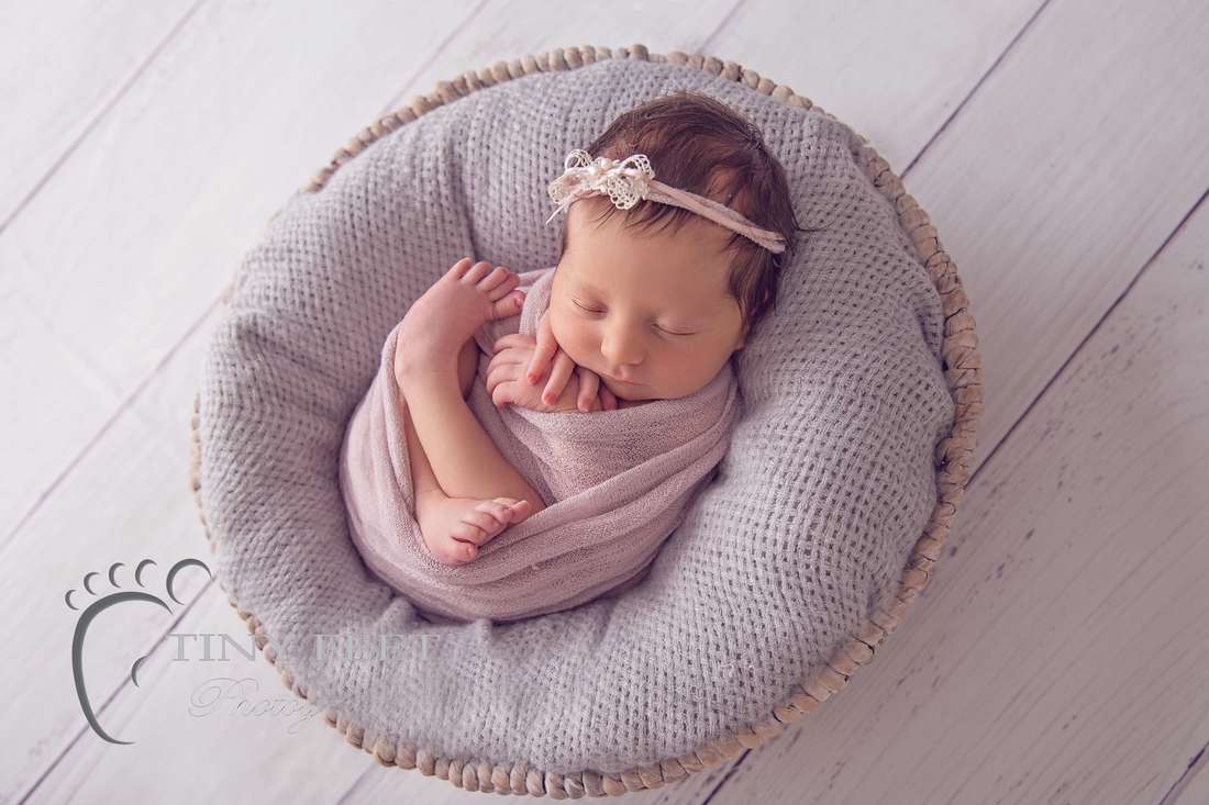 Tiny Feet Photography, newborn baby girl in pink wrap in a bowl