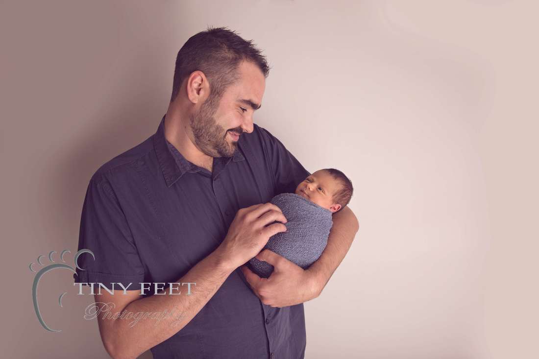 Tiny Feet Photography Newborn baby boy parent posing