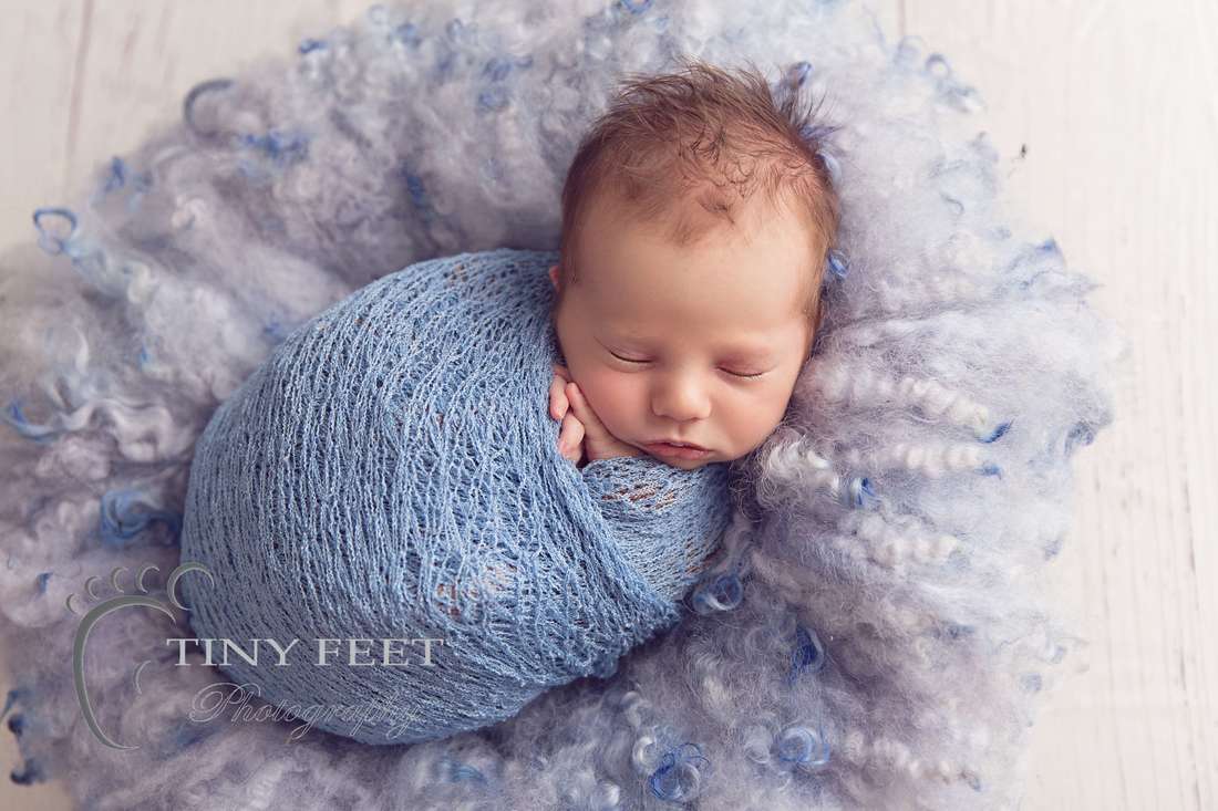 Tiny Feet Photography baby boy wrapped in blue wrap in bowl