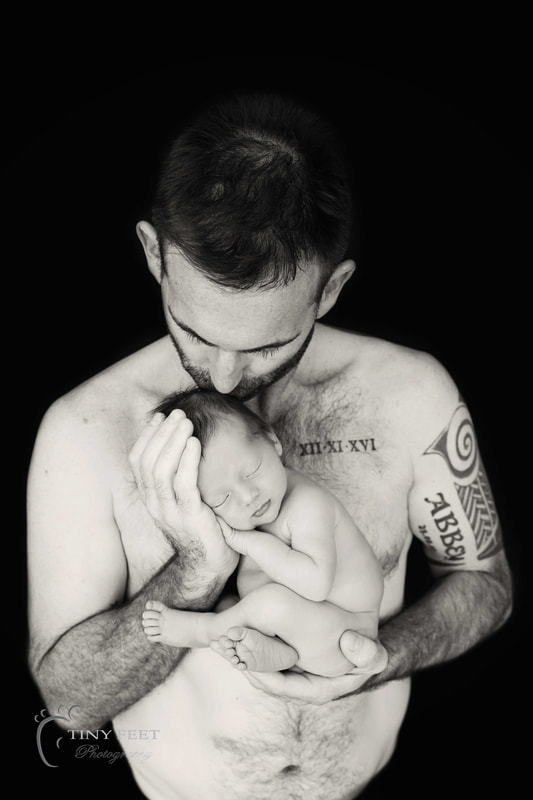 Tiny Feet Photography Newborn Baby posing with dad