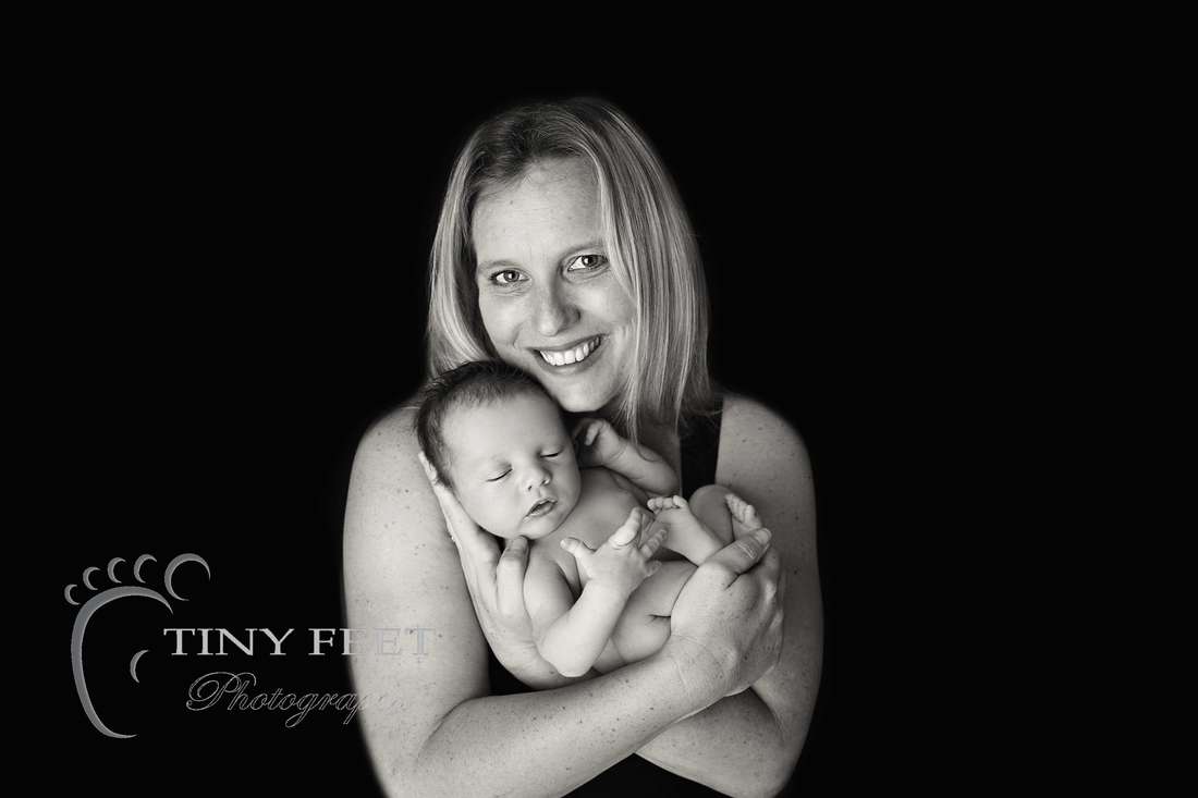 Tiny Feet Photography baby boy posed in mums hands