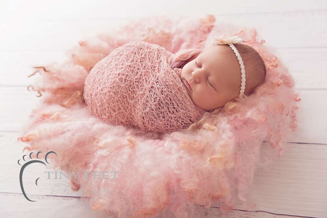 Tiny Feet Photography newborn baby girl posed in bowl backlit