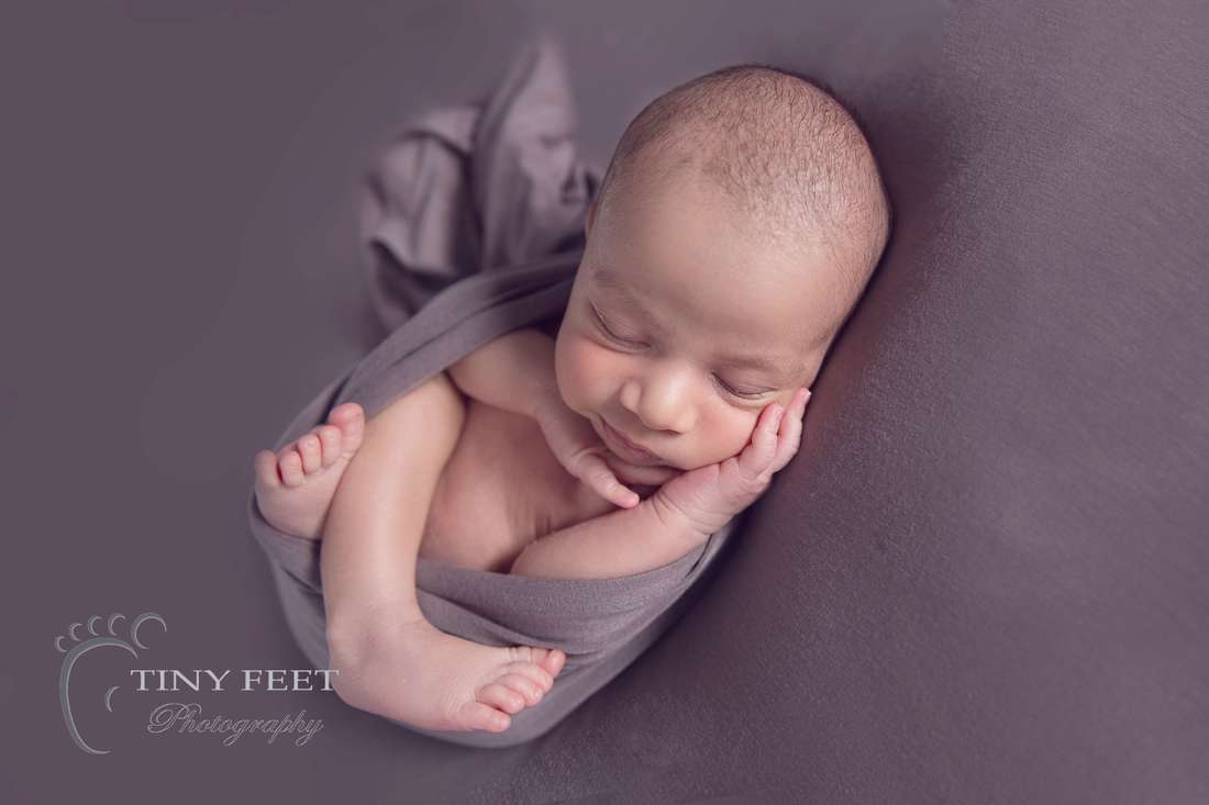 Tiny Feet Photography Potato wrapped newborn poses on the beanbag