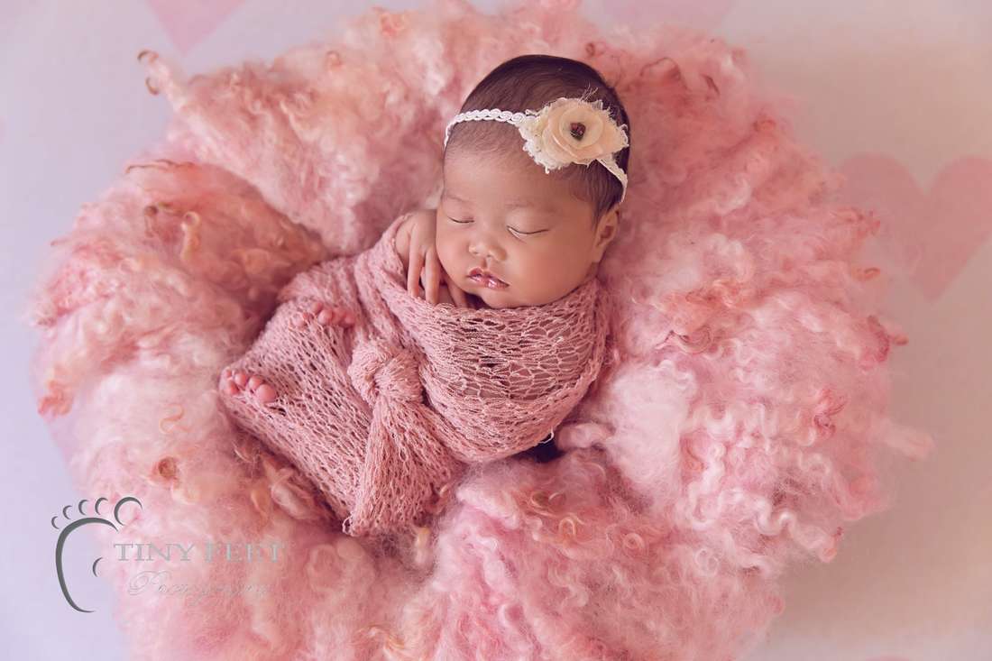 Tiny Feet Photography newborn baby girl in pink curly felt