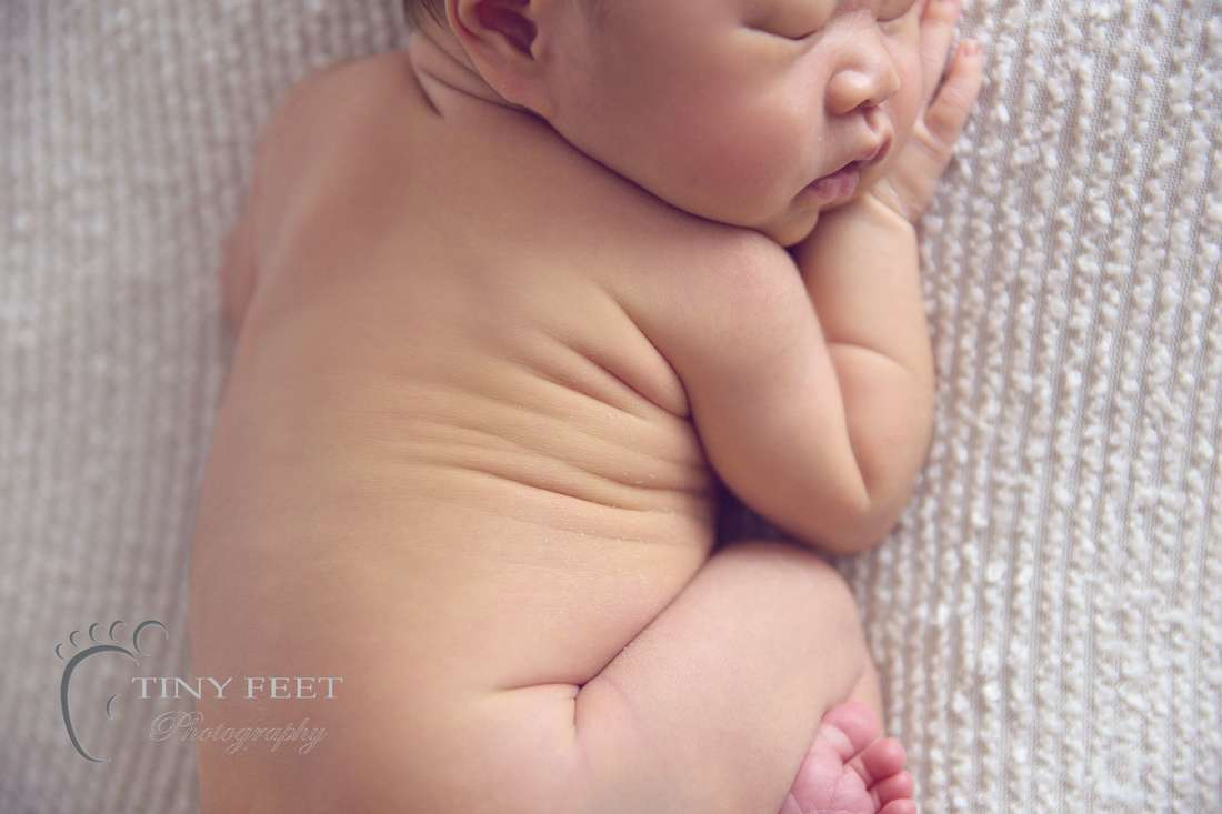 Tiny Feet Photography Newborn baby boy bum up pose on beanbag