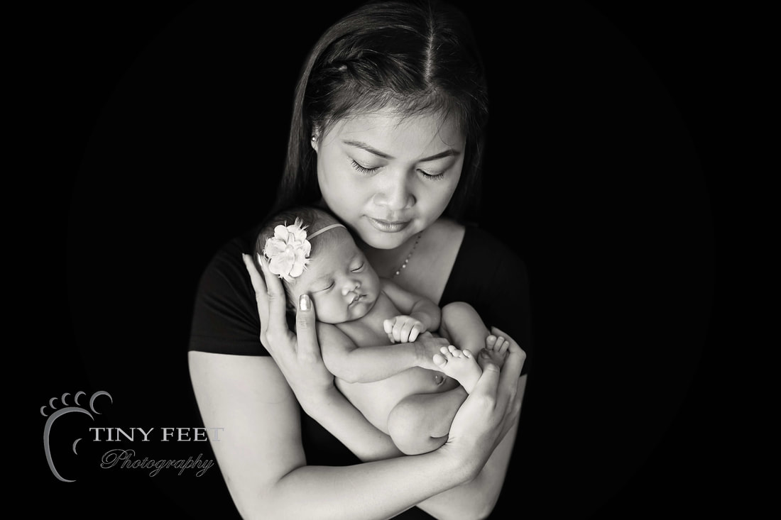 Tiny Feet Photography newborn baby girl posed with mum in black and white