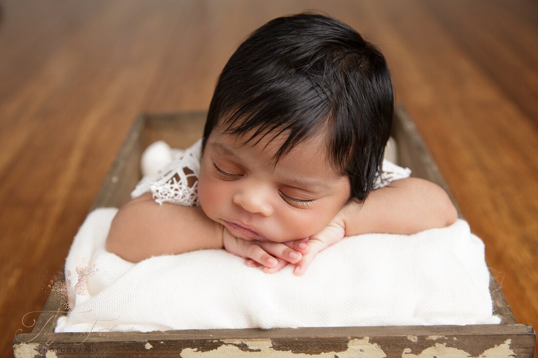 Tiny Feet Photography Newborn girl in wooden crate