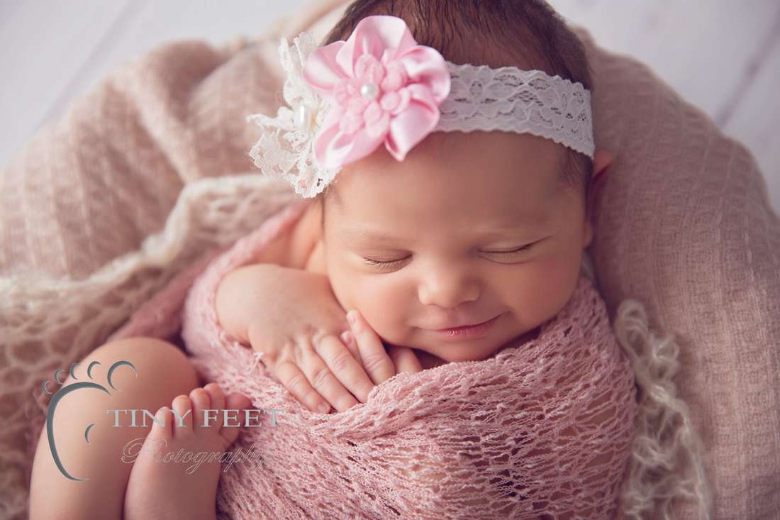 Tiny Feet Photography baby girl posed with pink basket
