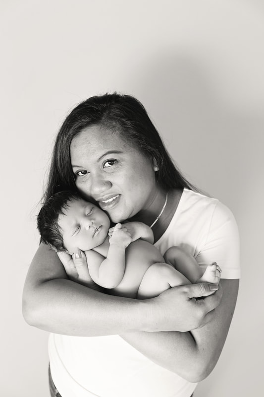 Black and White baby girl posed with mum
