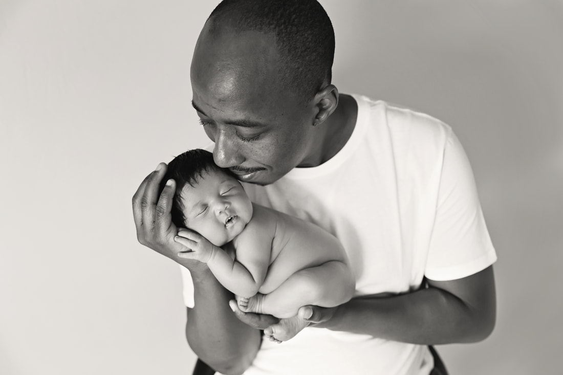 Black and White Baby girl posed with dad